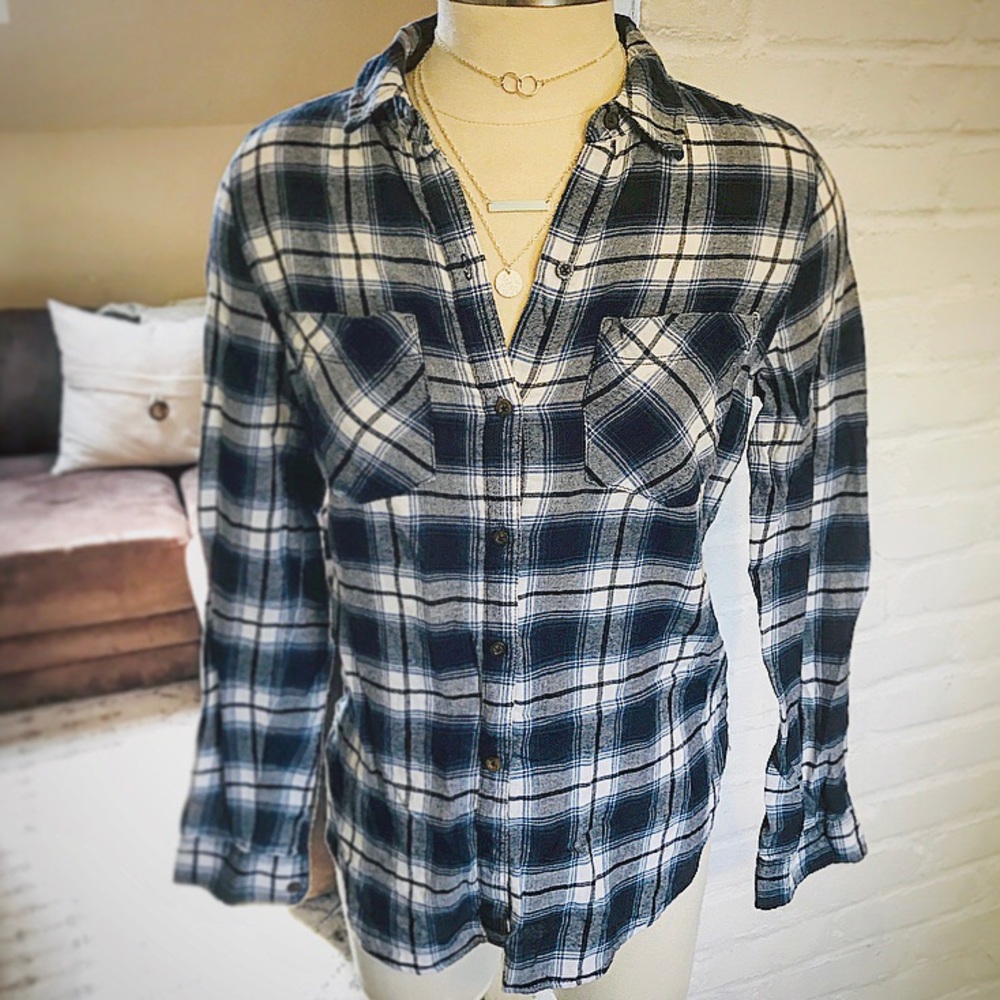 Blue plaid long sleeve, button down, shirt.